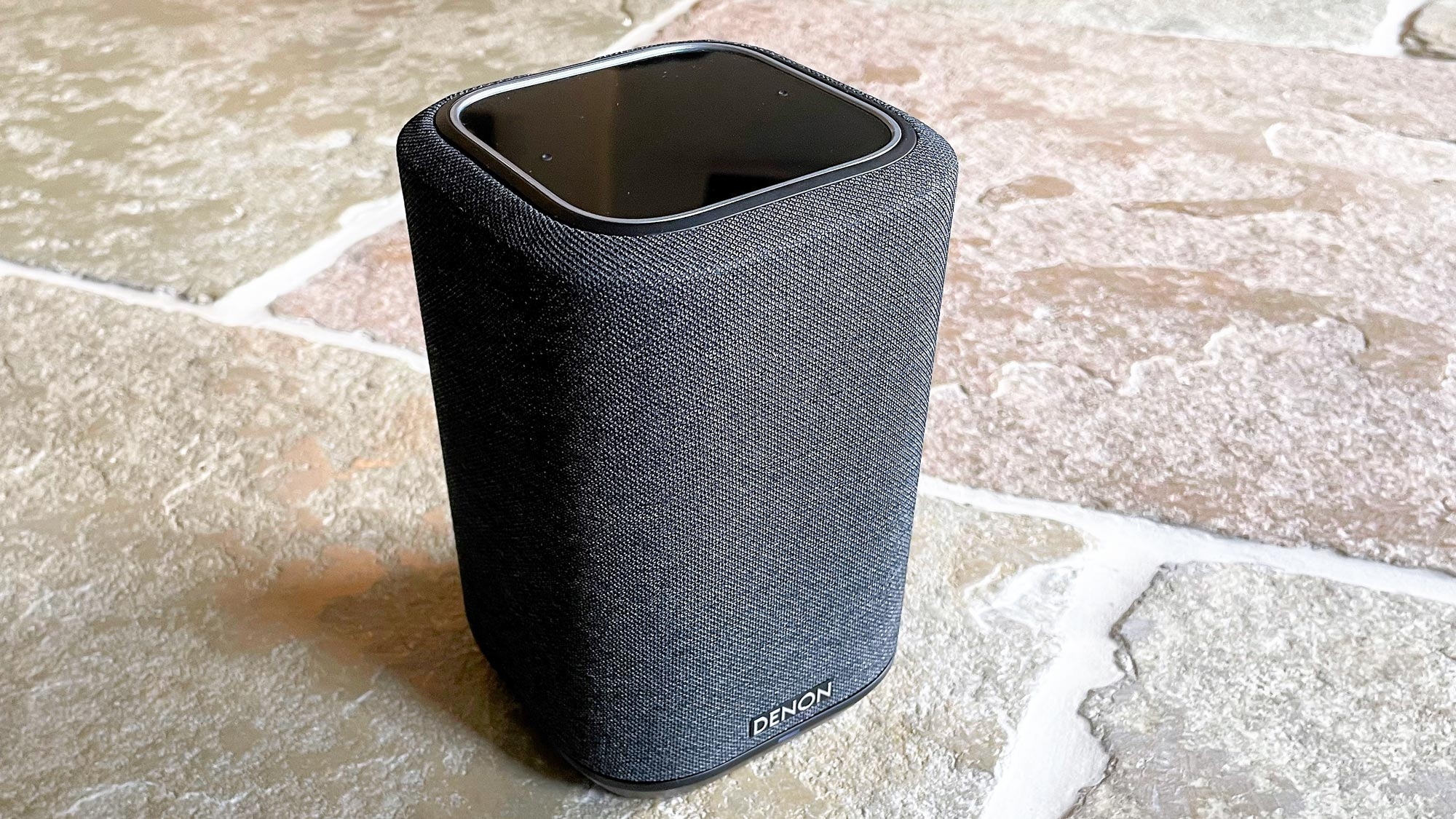 Denon Home 150 on a stone floor