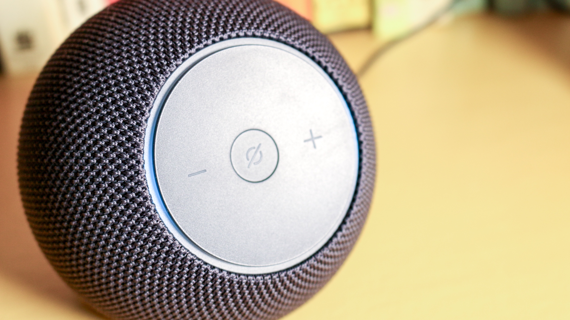 Echo Dot Max on a book shelf